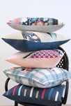 Dare fabrics pillow stacked