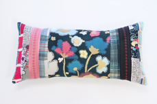 Quilted pillow with bold colors